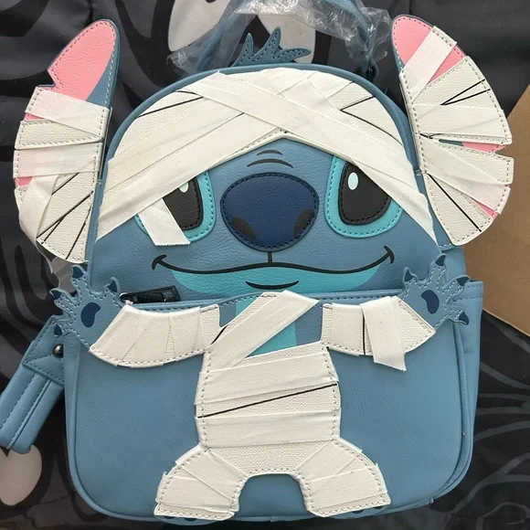 Bags | Stitch Mummy Mini Backpack Our Universe | Poshmark display picture 2